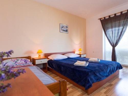 Postel nebo postele na pokoji v ubytování Apartment in Senj Lika-Karlovac with private pool