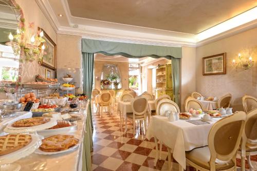 Restoran ili drugo mesto za obedovanje u objektu Hotel Olimpia Venice, BW Signature Collection 3sup