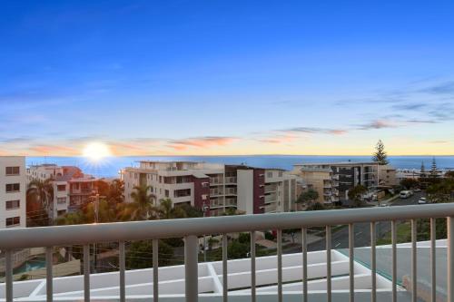 
a view from a balcony overlooking a city at Kings Bay Apartments in Caloundra
