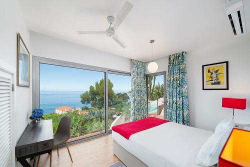 Postel nebo postele na pokoji v ubytování OurMadeira - Villa do Mar IV, secluded