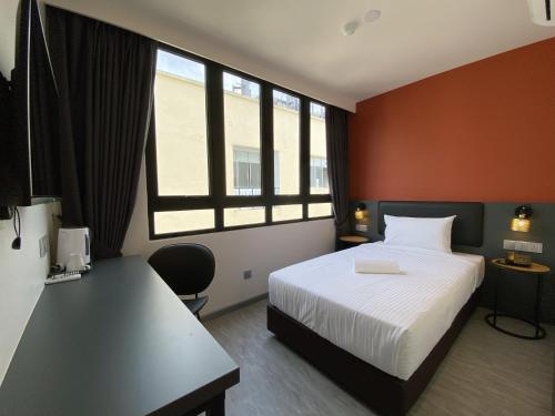 Woco Boutique Hotel Kinraraにあるベッド