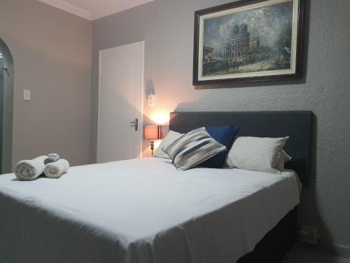 Postel nebo postele na pokoji v ubytování Housemartin Guest House
