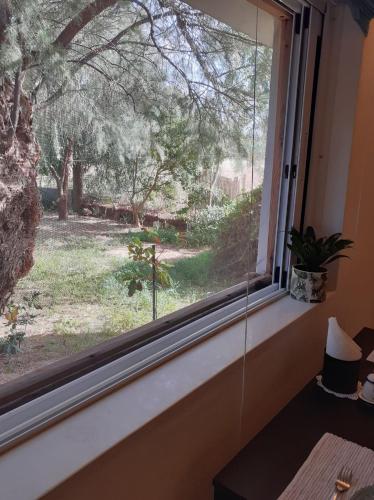 a window with a view of a yard at Sea and Sun in Amoudara Herakliou