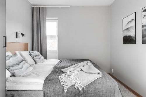 Postel nebo postele na pokoji v ubytování Apartments Mölndal