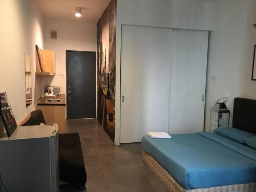 Ένα ή περισσότερα κρεβάτια σε δωμάτιο στο Empihaus 002 Empire Damansara