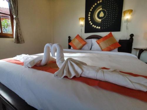 Katil atau katil-katil dalam bilik di Grand Sea Beach Resort