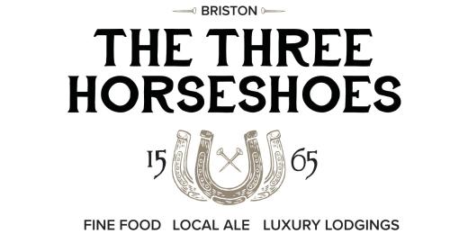 a logo for the three horseshoes at The Three Horseshoes in Briston