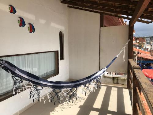 Un balcón o terraza en Casa de ferias pé na areia