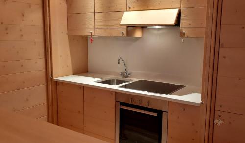 a kitchen with a sink and a counter top at ARABELLA in Bad Kleinkirchheim