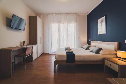 Letto o letti in una camera di Trip Room & Breakfast