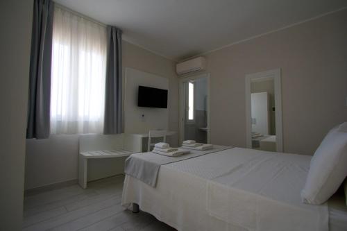 Fotografie z fotogalerie ubytování La Guitgia Rooms v destinaci Lampedusa