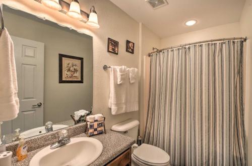 a bathroom with a shower and a sink and a toilet at Blairsville Home with Deck and Stunning Mountain Views in Hood