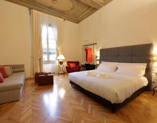 Llit o llits en una habitació de Corsini Tintori