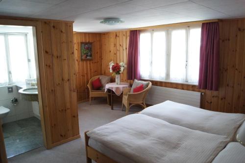 Posezení v ubytování Hotel Alpina