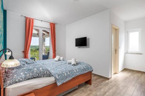 Posteľ alebo postele v izbe v ubytovaní Villa Aurelia