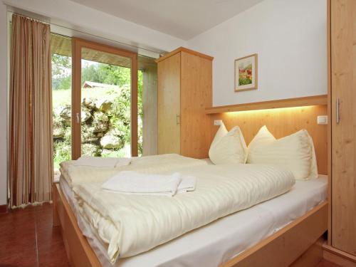 Postel nebo postele na pokoji v ubytování Apartment Maisonnette Im Wald 2