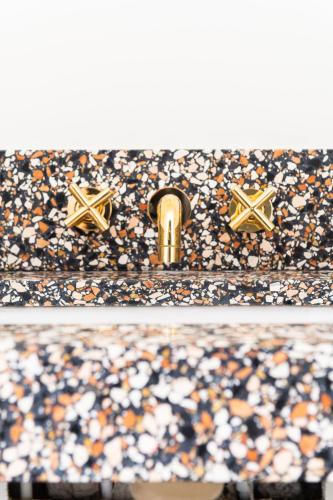 a close up of a purse with flowers on it at Bradford House, a Member of Design Hotels in Oklahoma City