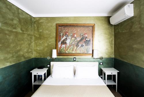 Postel nebo postele na pokoji v ubytování Hotel Diana
