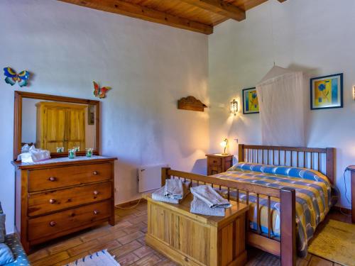 Postel nebo postele na pokoji v ubytování All houses are located in a finely restored Quinta