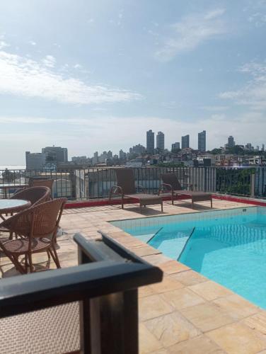 a swimming pool on the roof of a building at EDIFÍCIO METROPOLE ONDINA in Salvador