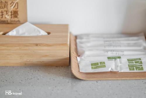 two wooden boxes sitting on top of a table at Taitung Spring Homestay B&B in Taitung City