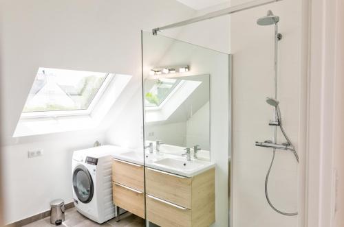 Ένα μπάνιο στο Résidence du Phare - 4 appartements - 2 chambres - Vue mer ou Terrasse