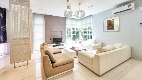 Zona de estar de Shamrock Villas Corner OR Seaview OR Standard