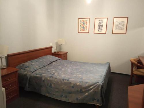 Łóżko lub łóżka w pokoju w obiekcie Rinaldi at Moscovsky Prospekt 18