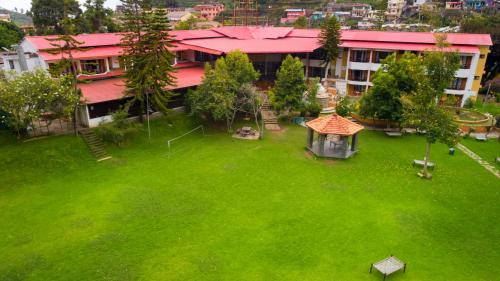 Κήπος έξω από το Hotel Kodai International