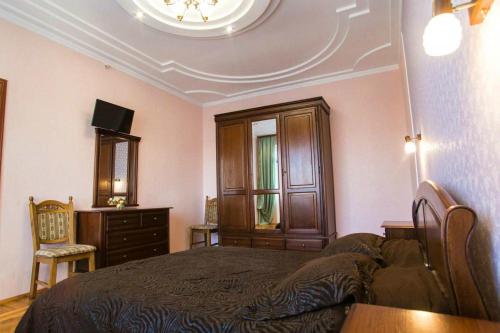 Ліжко або ліжка в номері Готельний Комплекс Юхнович