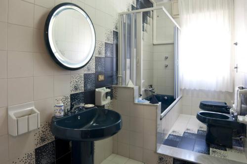 Koupelna v ubytování Armonia