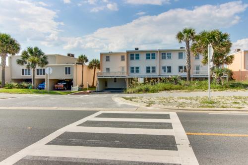 an empty street in front of a building at The Treehouse On the Bay in Pensacola Beach