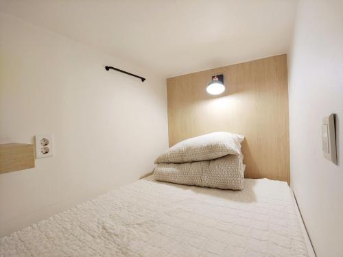 Кровать или кровати в номере MTT Guest House