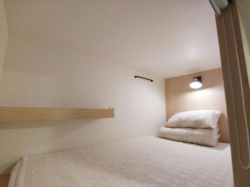 Кровать или кровати в номере MTT Guest House
