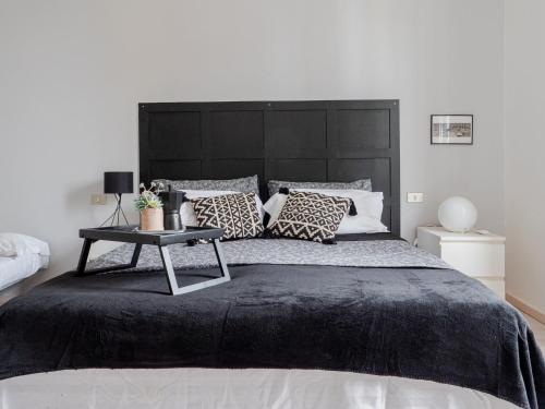 Letto o letti in una camera di The Best Rent - Navigli Apartment