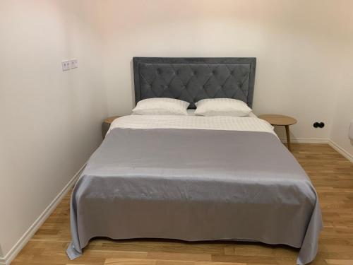 Postel nebo postele na pokoji v ubytování Piiri Apartment