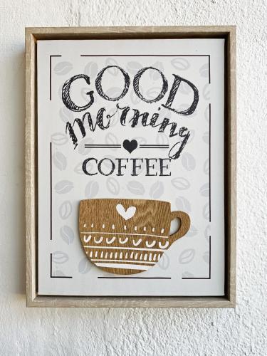 a picture of a coffee cup with the words good morning coffee at Hotel Blawa in Abidjan