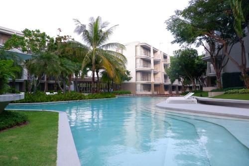 Baan San Kraam 5206 Cha-am Hau Hinの敷地内または近くにあるプール