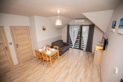 Posezení v ubytování Apartamenty PIER