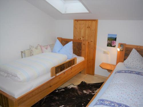 Кровать или кровати в номере Adlerhof