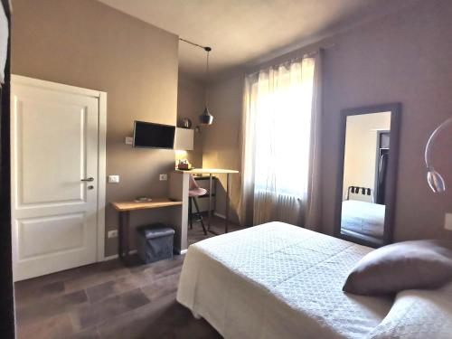 Katil atau katil-katil dalam bilik di PARMA EXPRESS Parma centro Privat Parking Free