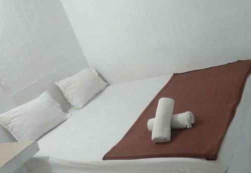 Tempat tidur dalam kamar di G357 Near Margo City