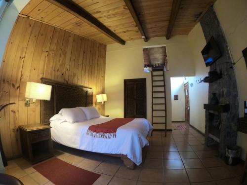 Postel nebo postele na pokoji v ubytování Cabañas La Cascada