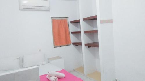 A bed or beds in a room at G357 Near Margo City