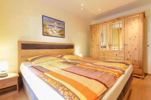 Een bed of bedden in een kamer bij Villa Margot Whg. 3