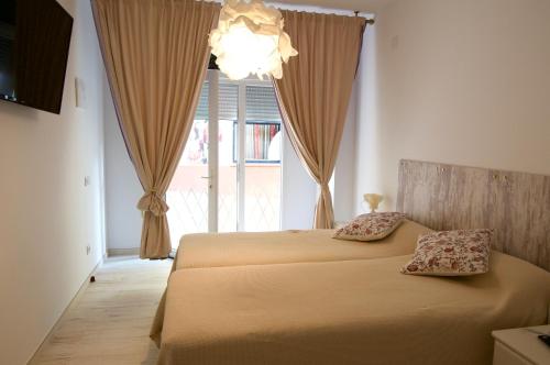 Postel nebo postele na pokoji v ubytování Loft Valentia Ifach Calpe