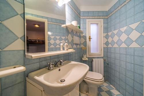 Et badeværelse på Villa Il Tramonto - Goelba