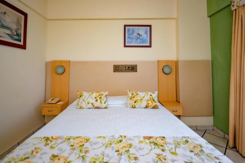Katil atau katil-katil dalam bilik di Yak Beach Hotel Ponta Negra