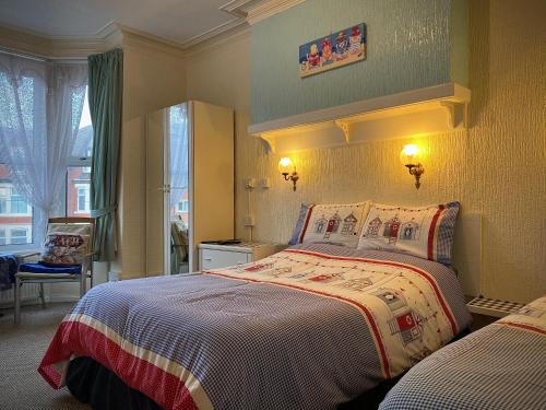 Llit o llits en una habitació de Cumbria Guest House