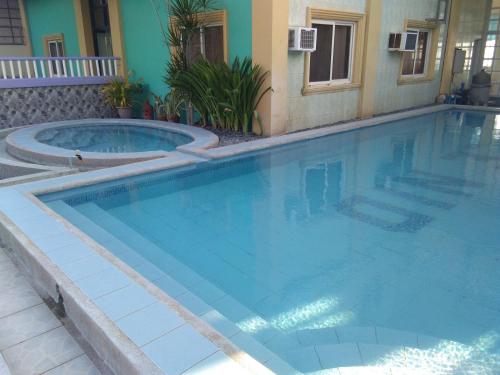 Swimming pool sa o malapit sa Watermoon Beach Resort